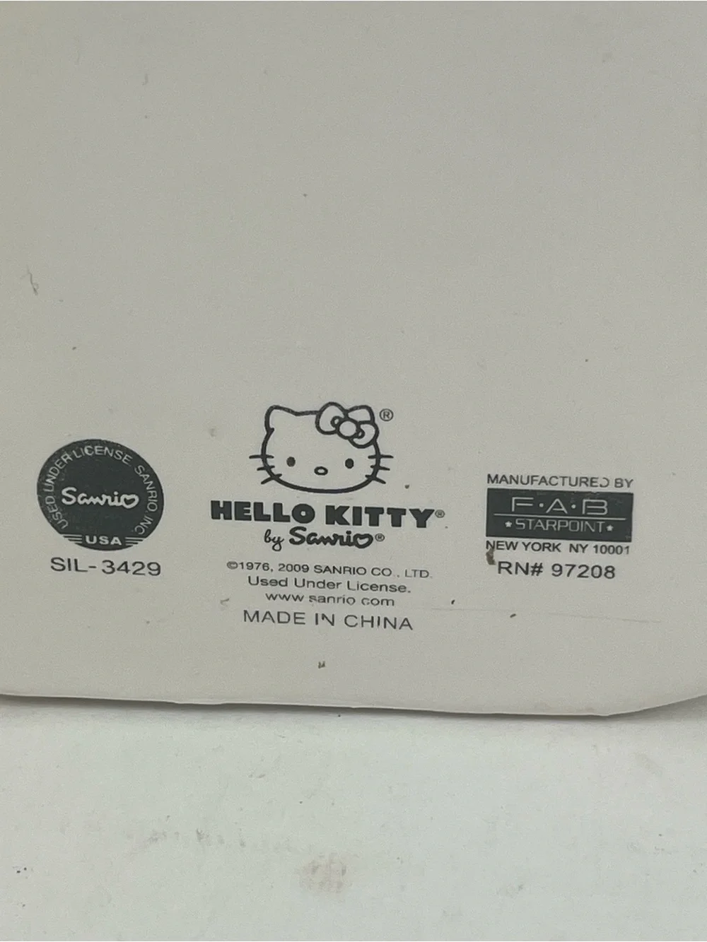 Hello Kitty Ceramic Piggy Coin Bank 2006 Sanrio #97208 Face Design.